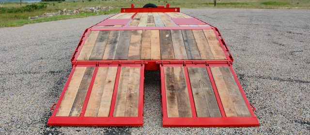 Model PX Pintle Hitch trailer with oak floor and wood filled dove and ramps
