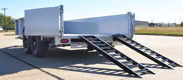 Dump trailer read slide-in ramps