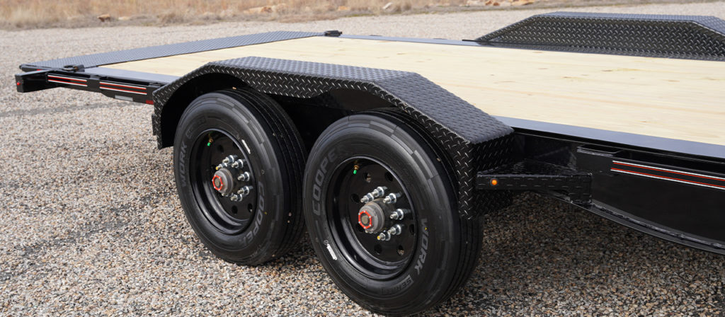 Model HDT tilt trailer with 3/16" Diamond Plate heavy duty fenders and 215/17.5 tires