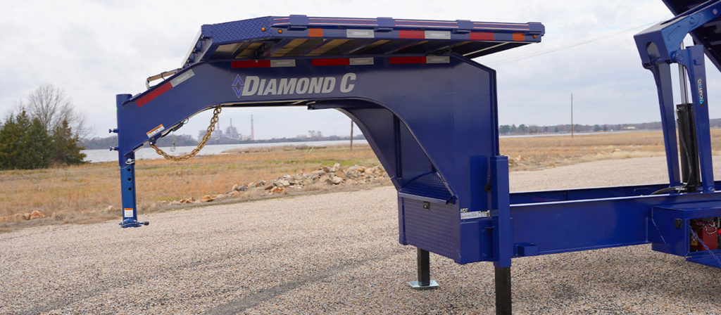 Model WDT dump trailer with gooseneck package and deck on the neck