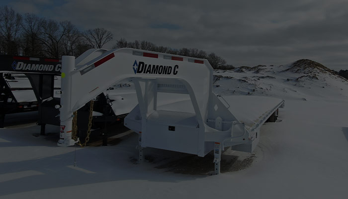 Diamond C's White Fleetneck Trailer in the Winter Covered in Snow