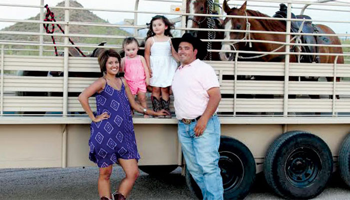 A family picture of the owners of Hays Trailer Sales