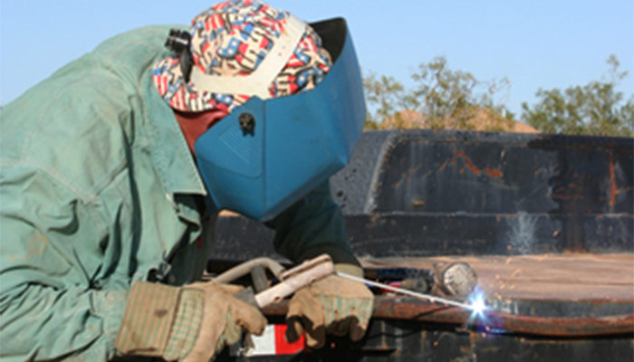 Welding at Trailer Source.