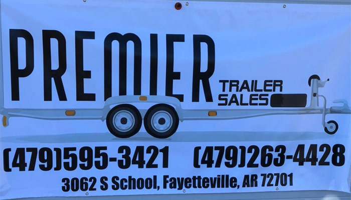 Premier Trailer Sales sign.