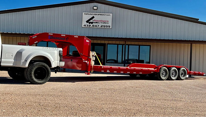A Diamond C trailer in front of Southern Trailers.