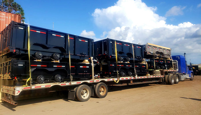 A truckload of Diamond C trailers at Tropic Trailer.