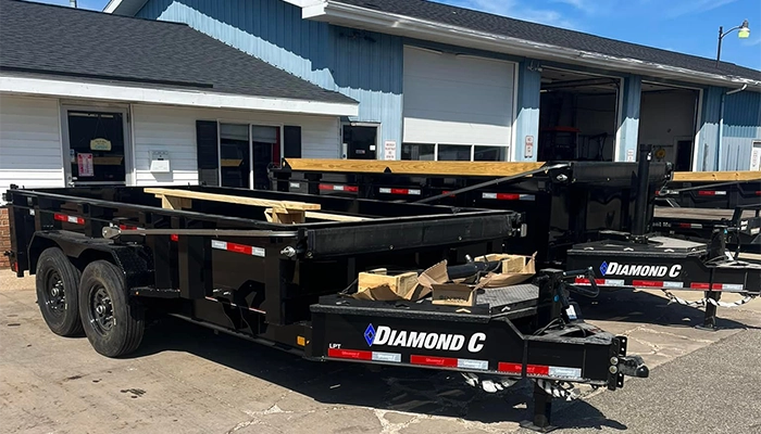 Holland Trailer with a Diamond C trailer.
