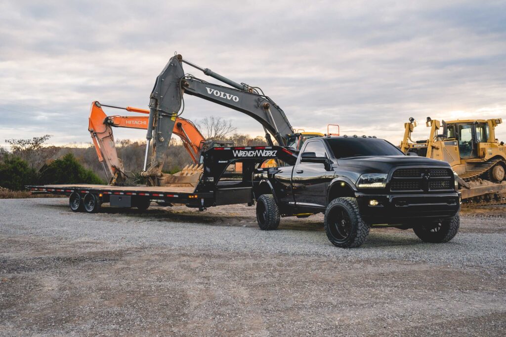 Greg Alberalla on a worksite with a Diamond C trailer.