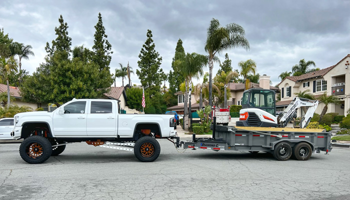 Ryan Fusco pulling a Diamond C trailer.