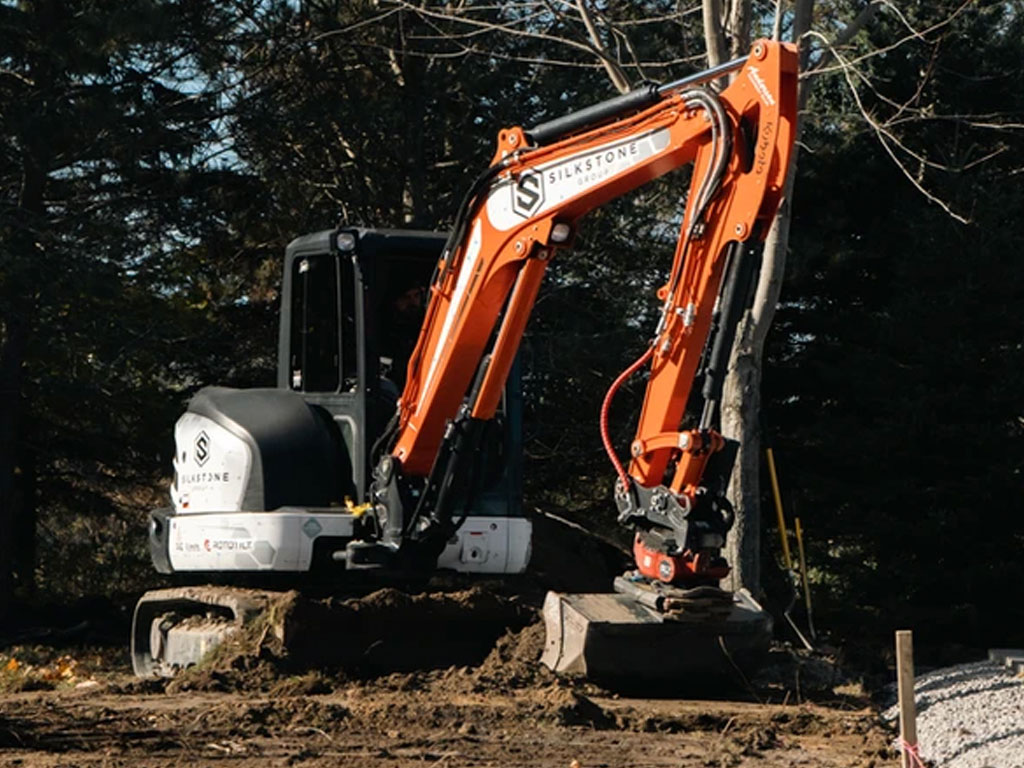 LAND CLEARING BACKHOE